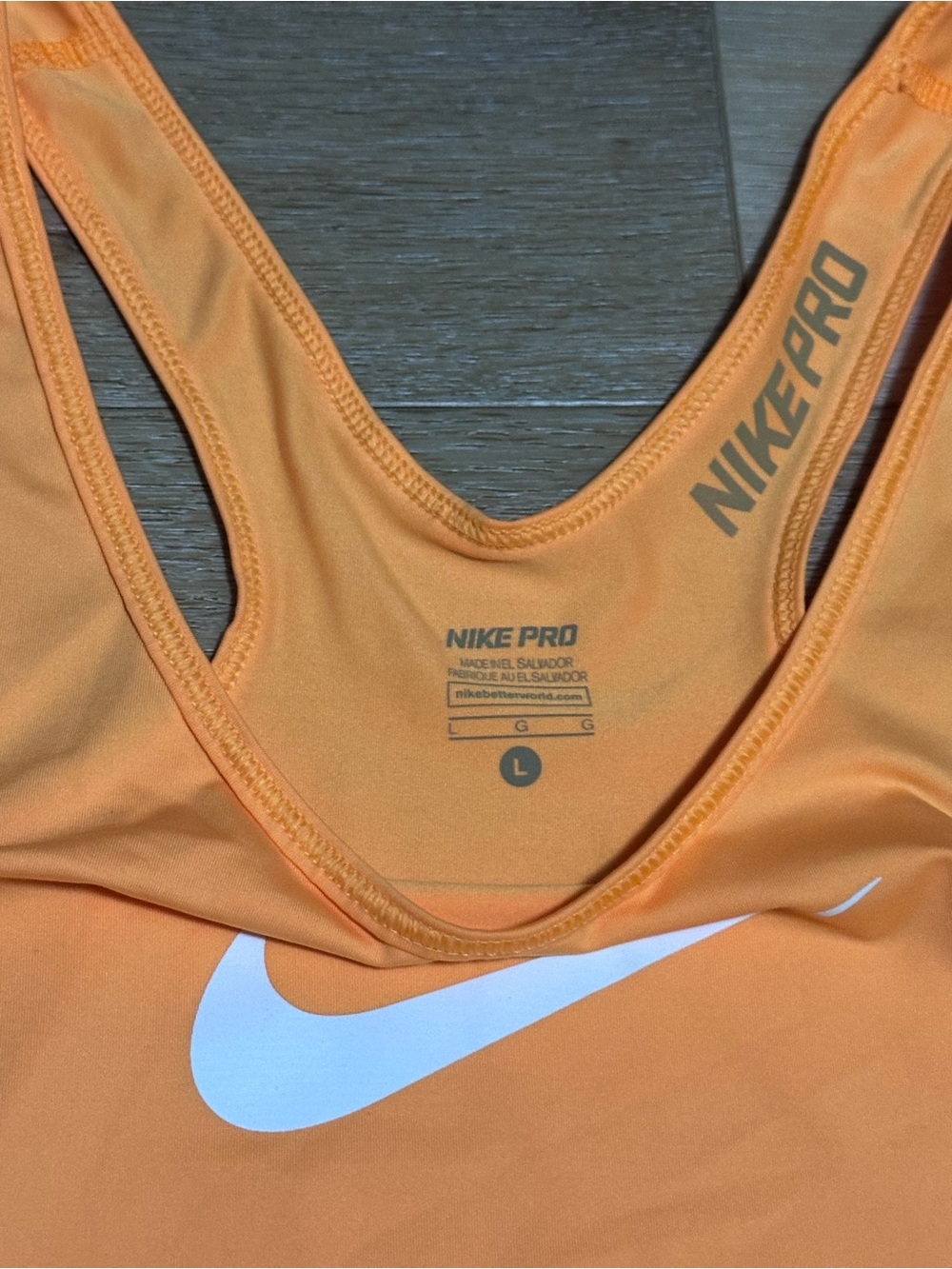 Nike Women's Orange Racerback Tank with White Swoosh - Picture 2 of 2